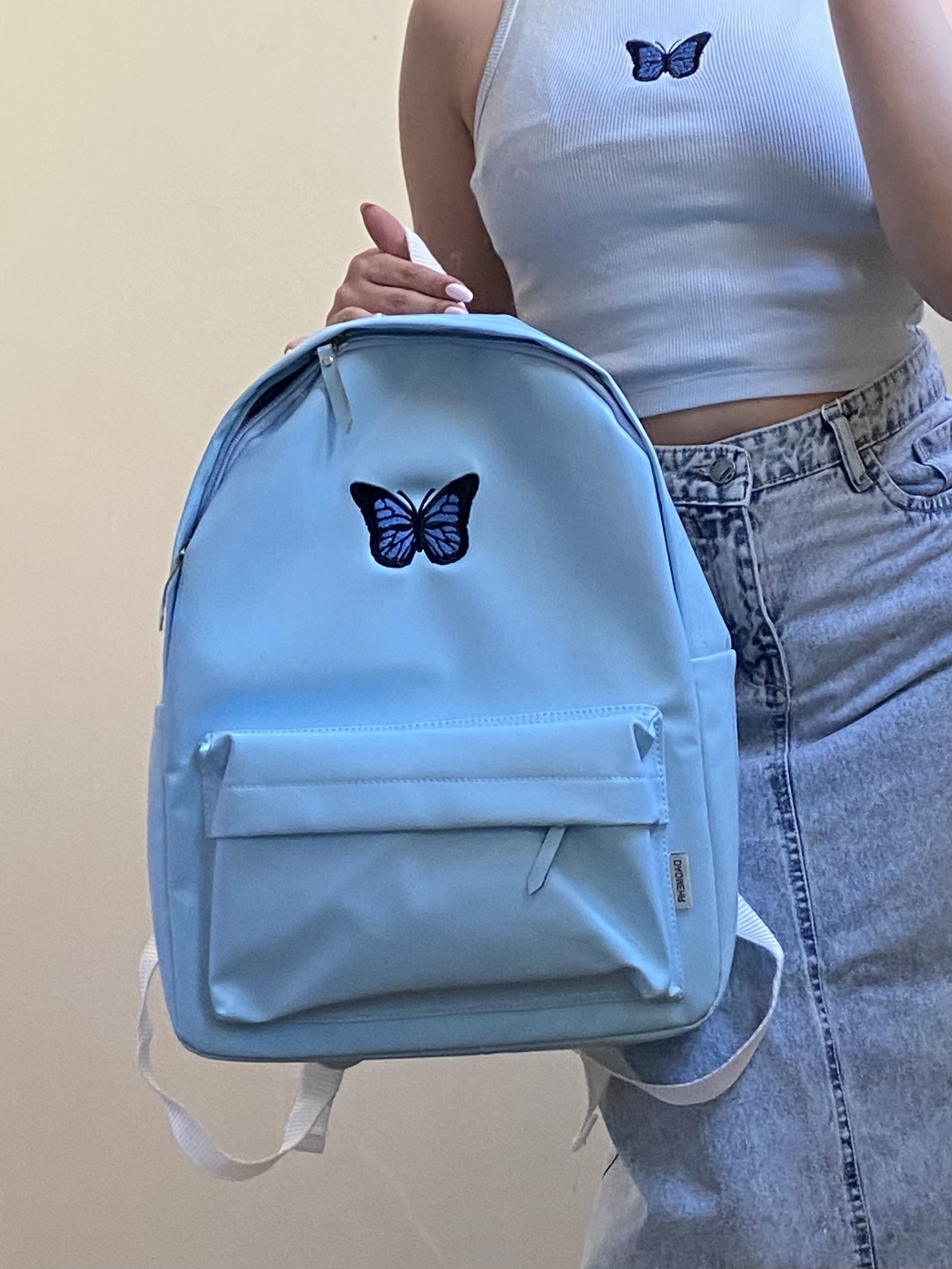 کوله چرم آبی اسمانی پروانه